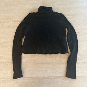 Reformation black ribbed turtle neck sweater size small
